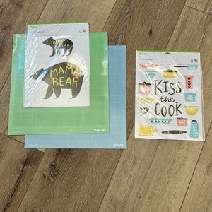 2 Cricut cutting pads & 2 iron on designs